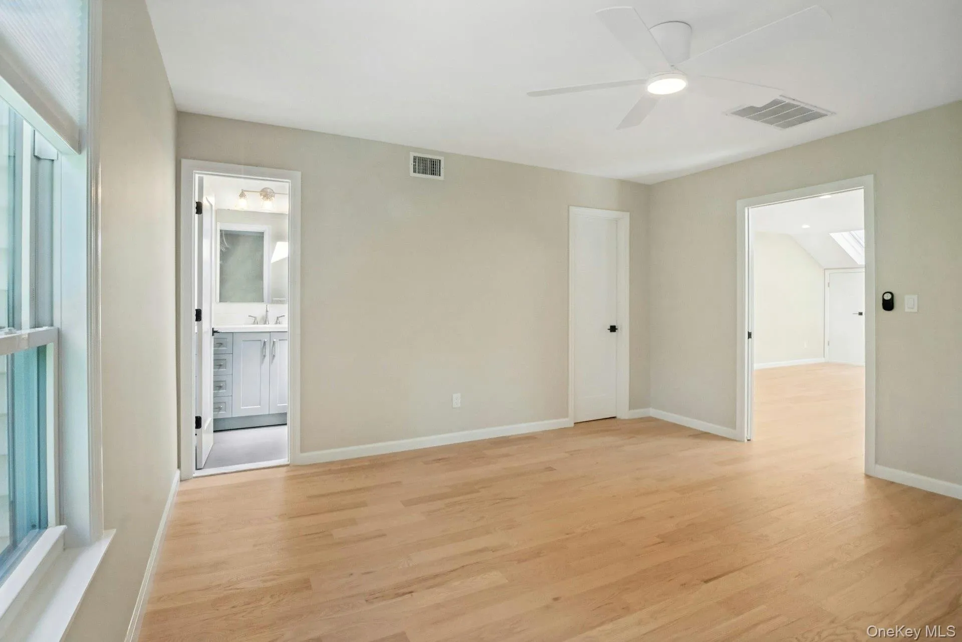 Hardwood floors and walk in closet. Hardwood floors and walk in closet.