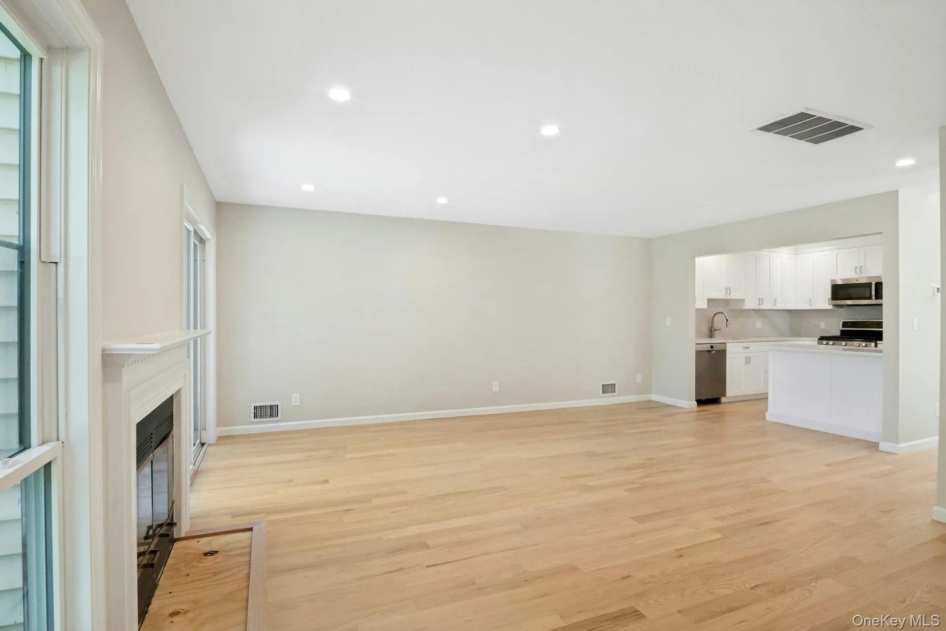Spacious sun filled living room. Spacious sun filled living room.