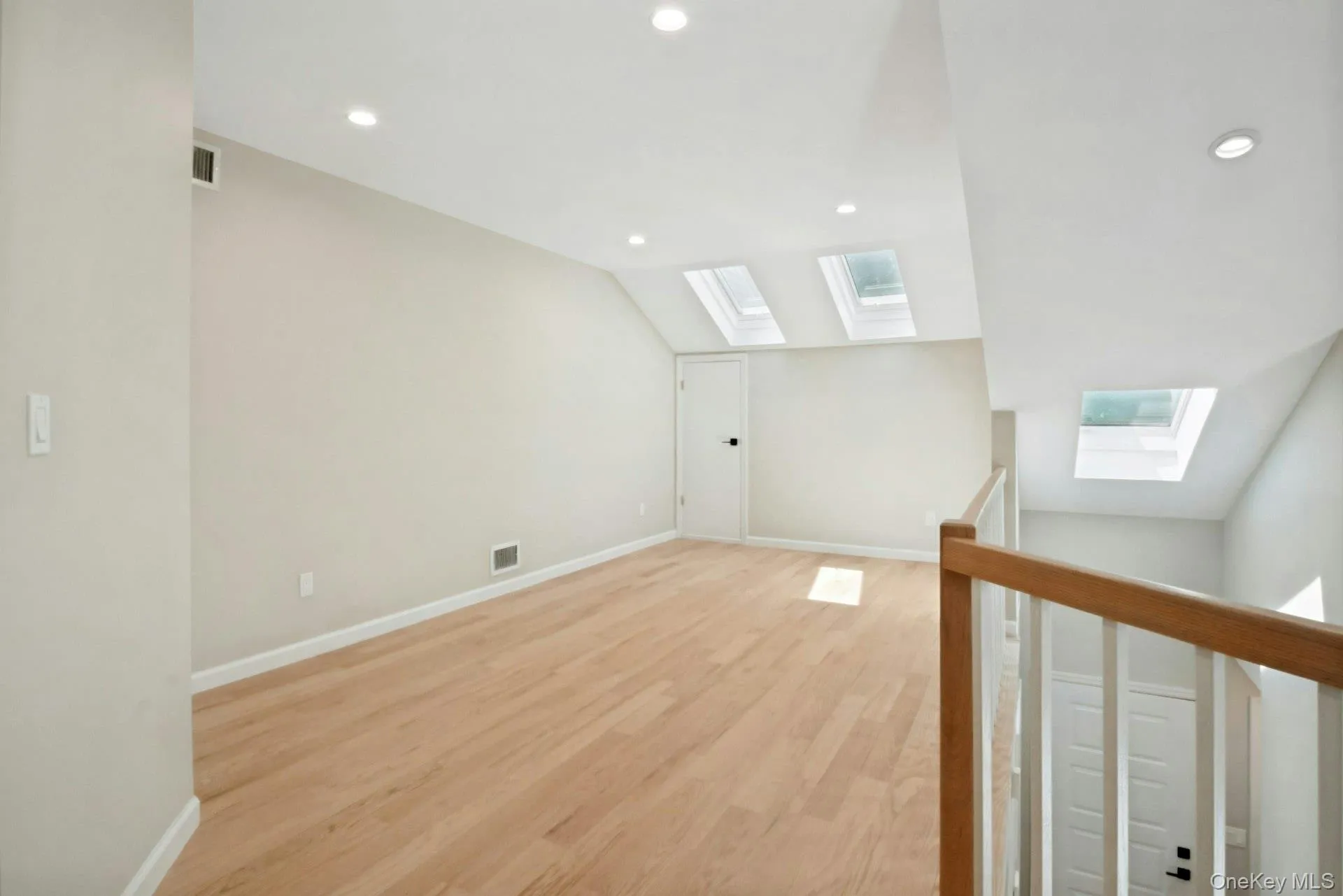 Loft with hardwood floors. Loft with hardwood floors.