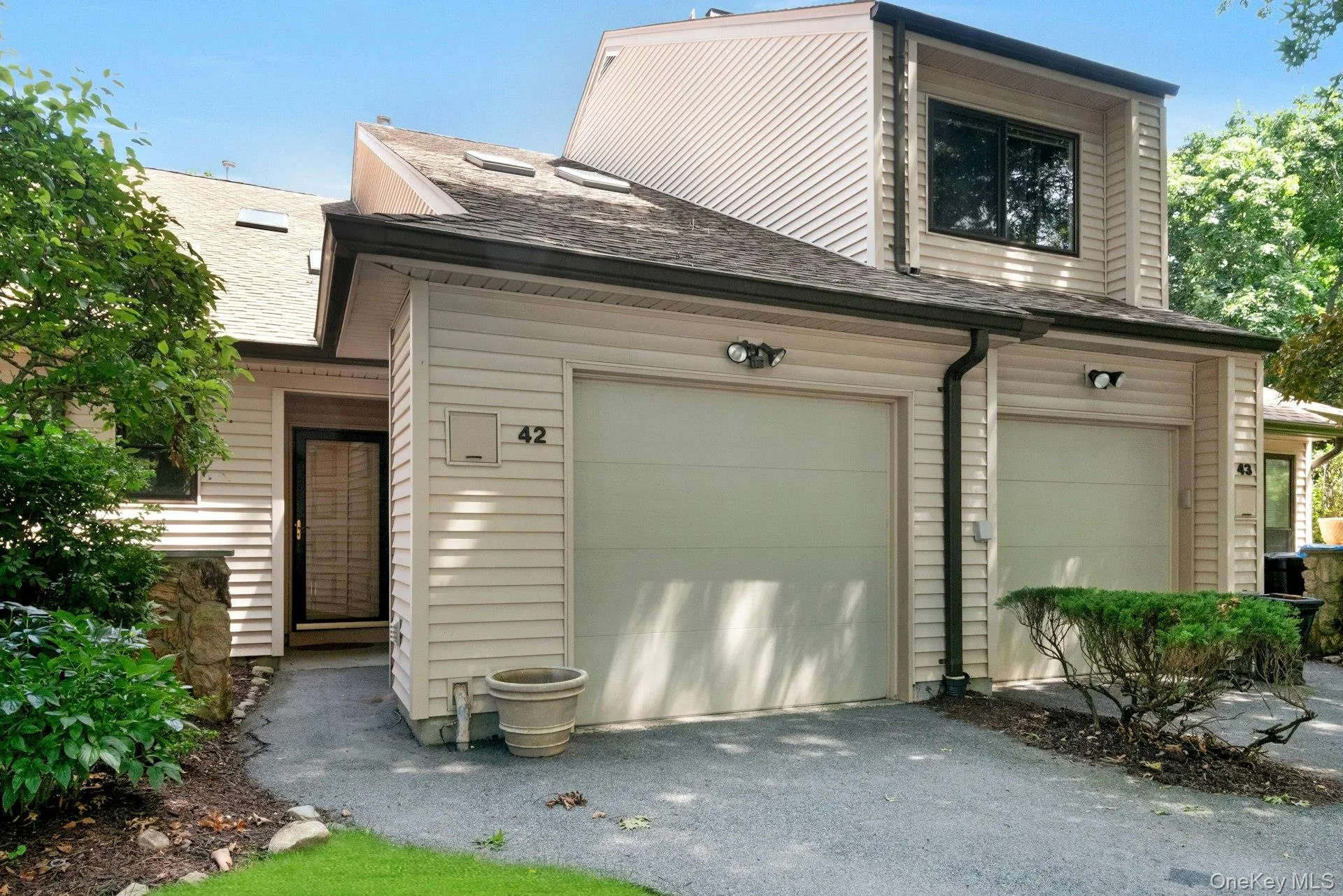 Attached garage and driveway parking. Attached garage and driveway parking.