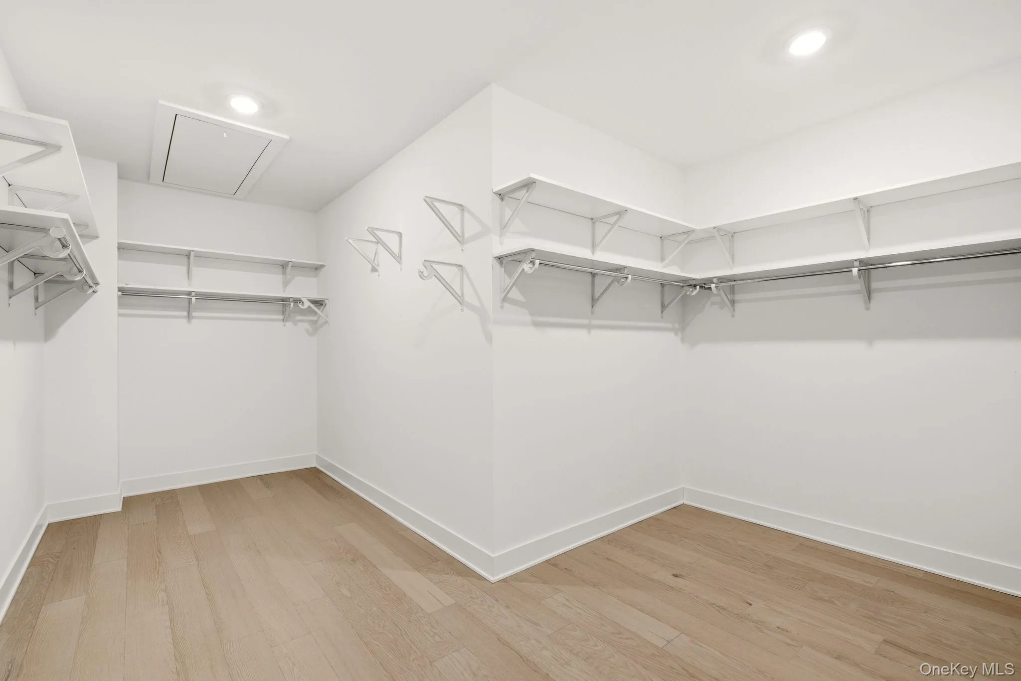 Primary walk-in closet Primary walk-in closet