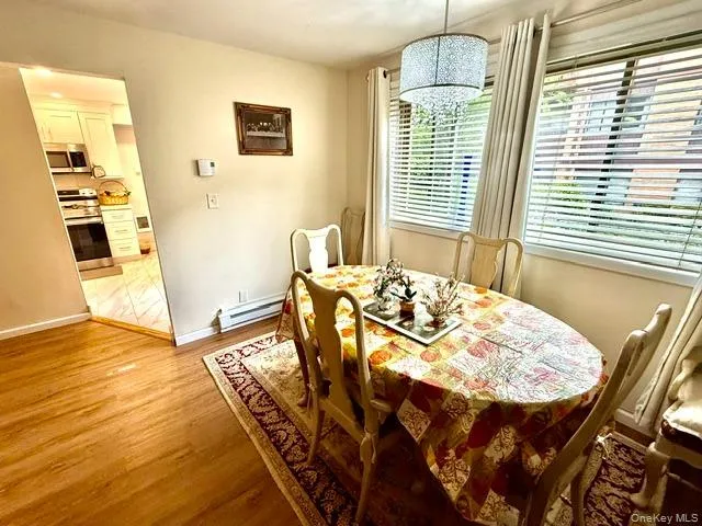 Lovely separate dining room area is part of the very large open concept living room /dining room. Lovely separate dining room area is part of the very large open concept living room /dining room.