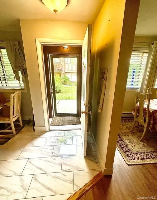 Vestibule entry for taking off shoes or wiping feet. Vestibule entry for taking off shoes or wiping feet.