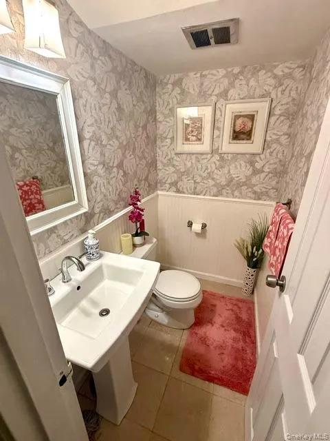 Lovey half bath on first floor Lovey half bath on first floor