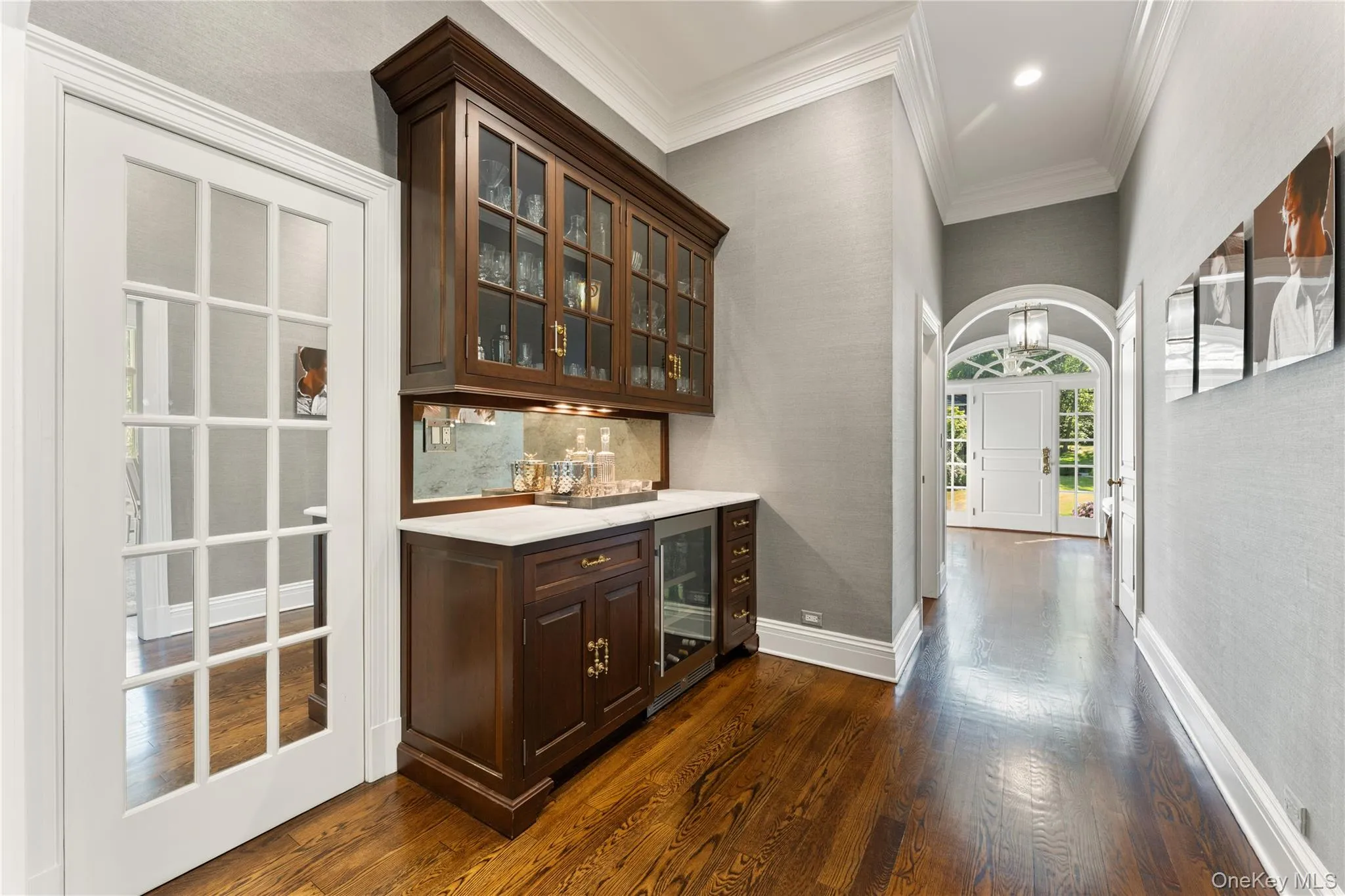 Butlers pantry with beverage refrigerator and custom cabinetry Butlers pantry with beverage refrigerator and custom cabinetry