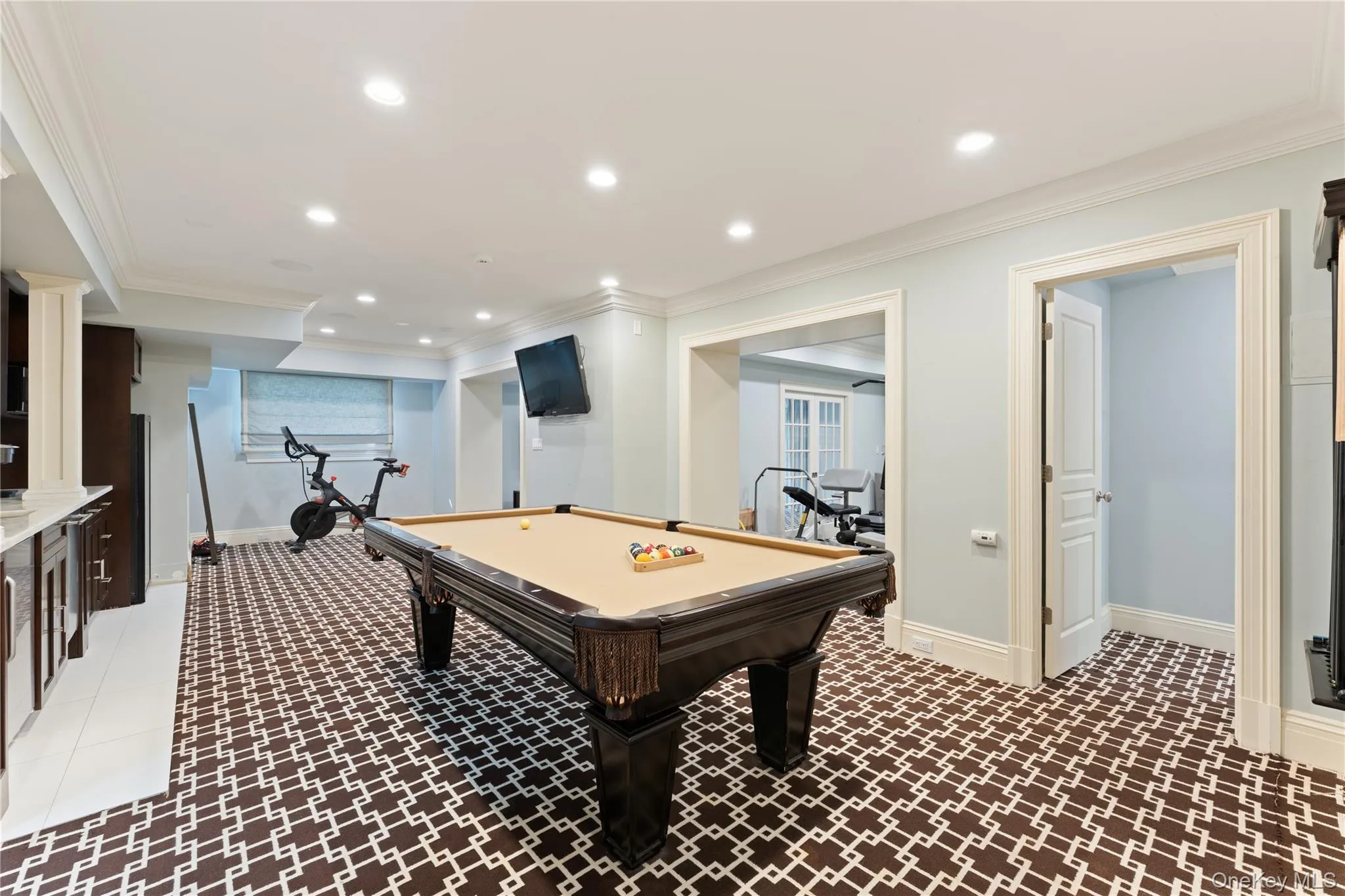 lower level recreation room includes, access to outside, media room, bedroom, bathroom, two large storage closets, gym lower level recreation room includes, access to outside, media room, bedroom, bathroom, two large storage closets, gym