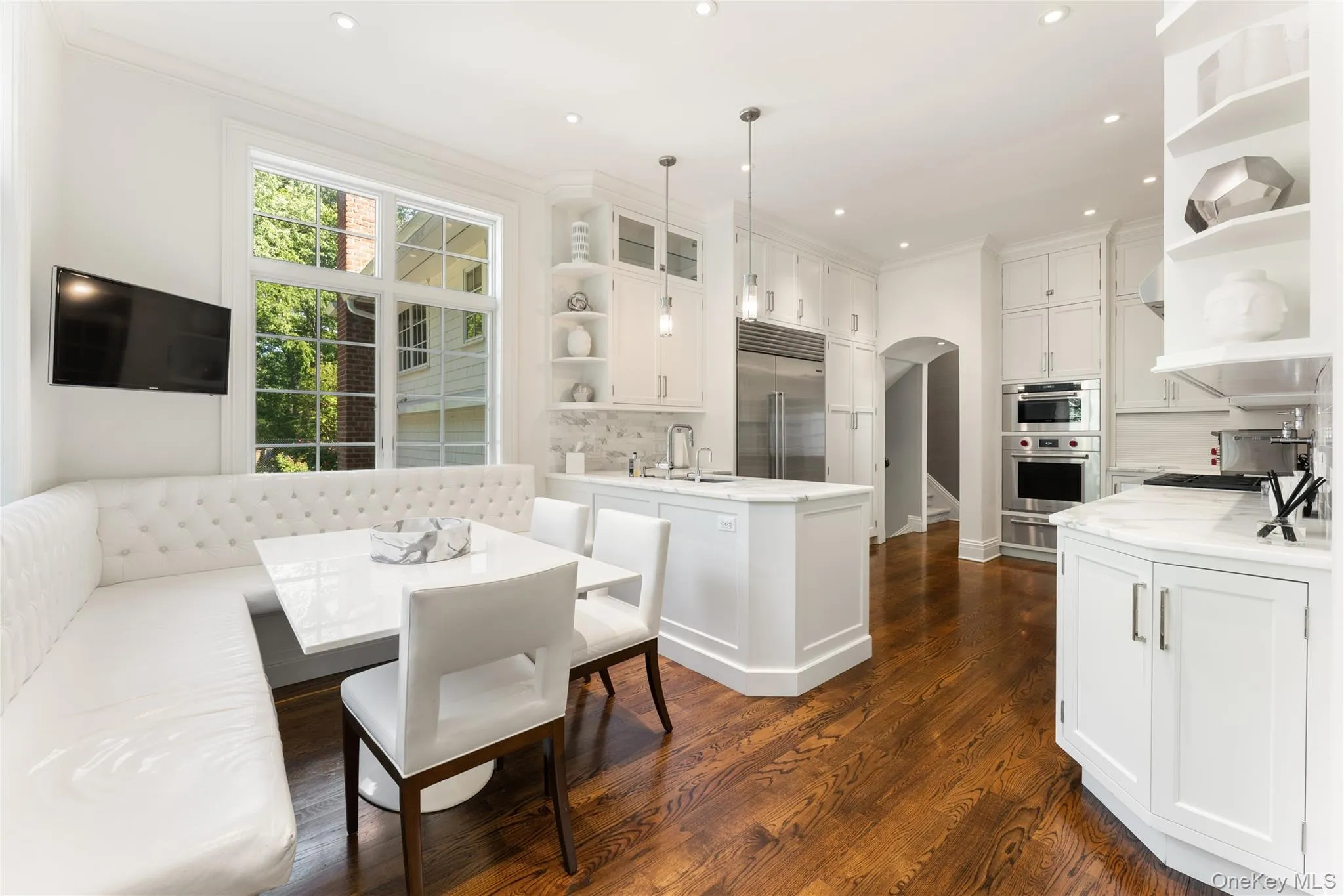 Chef’s kitchen with banquet breakfast nook Chef’s kitchen with banquet breakfast nook