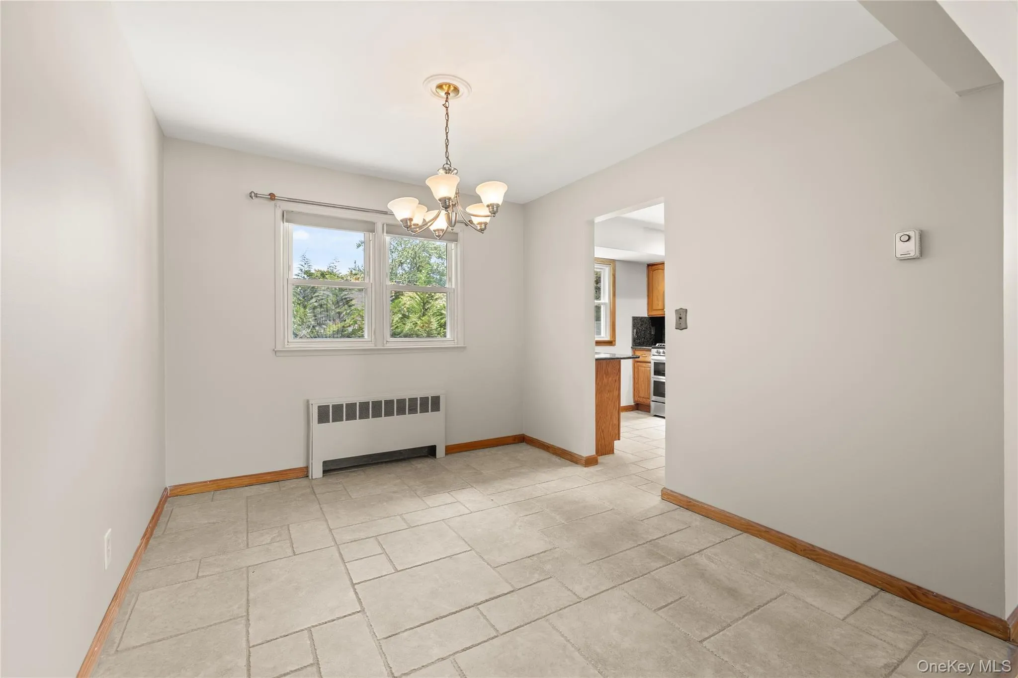 Formal dining room with tile flooring Formal dining room with tile flooring
