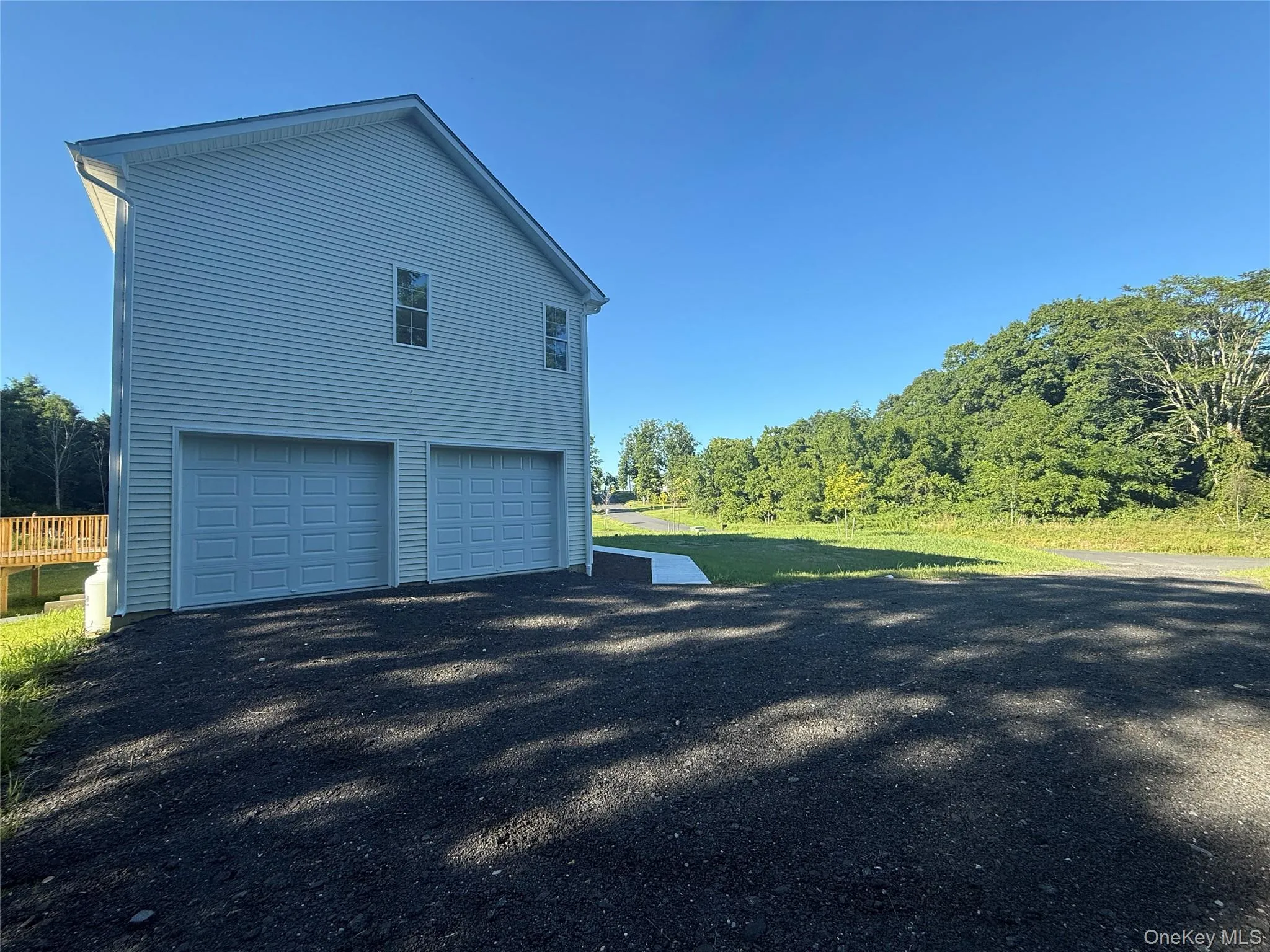Two car garage and oversized Driveway Two car garage and oversized Driveway