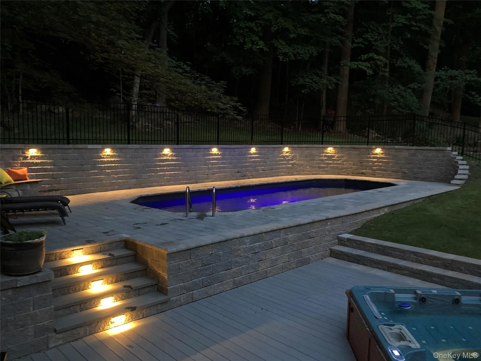 Illuminated pool deck for easy evening swims Illuminated pool deck for easy evening swims