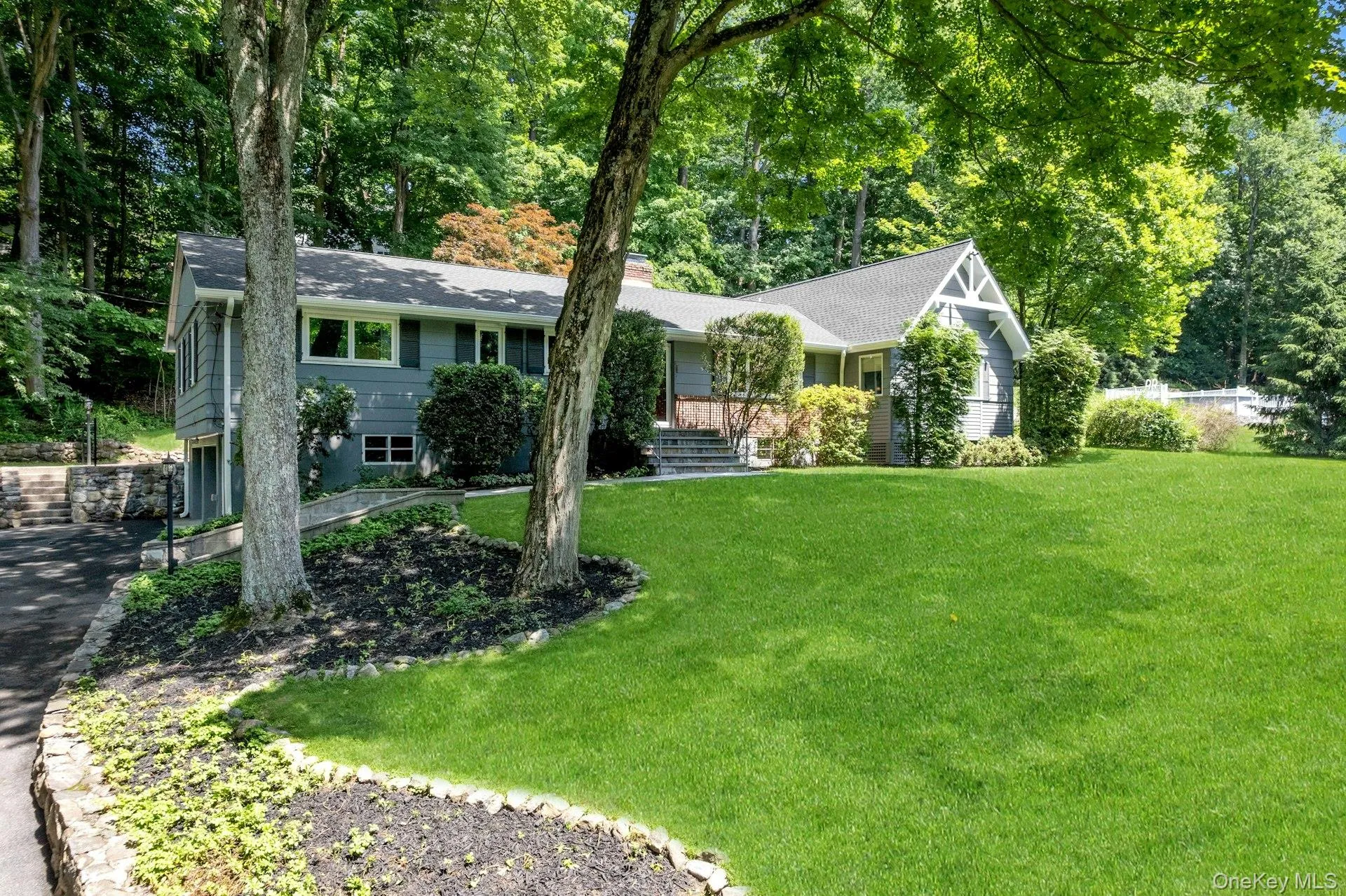 A sweeping driveway leads you to to easy access to 2 car garage. A sweeping driveway leads you to to easy access to 2 car garage.