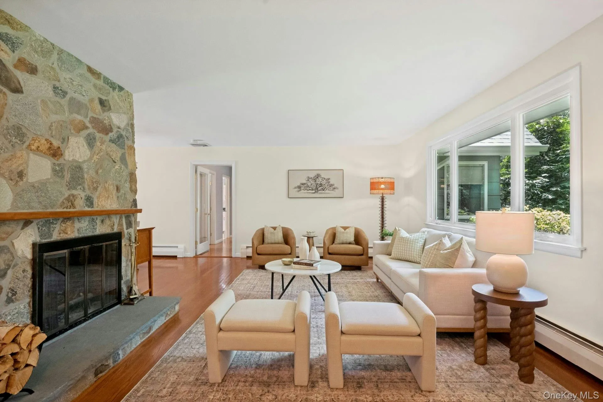 Large picture window affords great light and a view of beautiful sunsets. Large picture window affords great light and a view of beautiful sunsets.