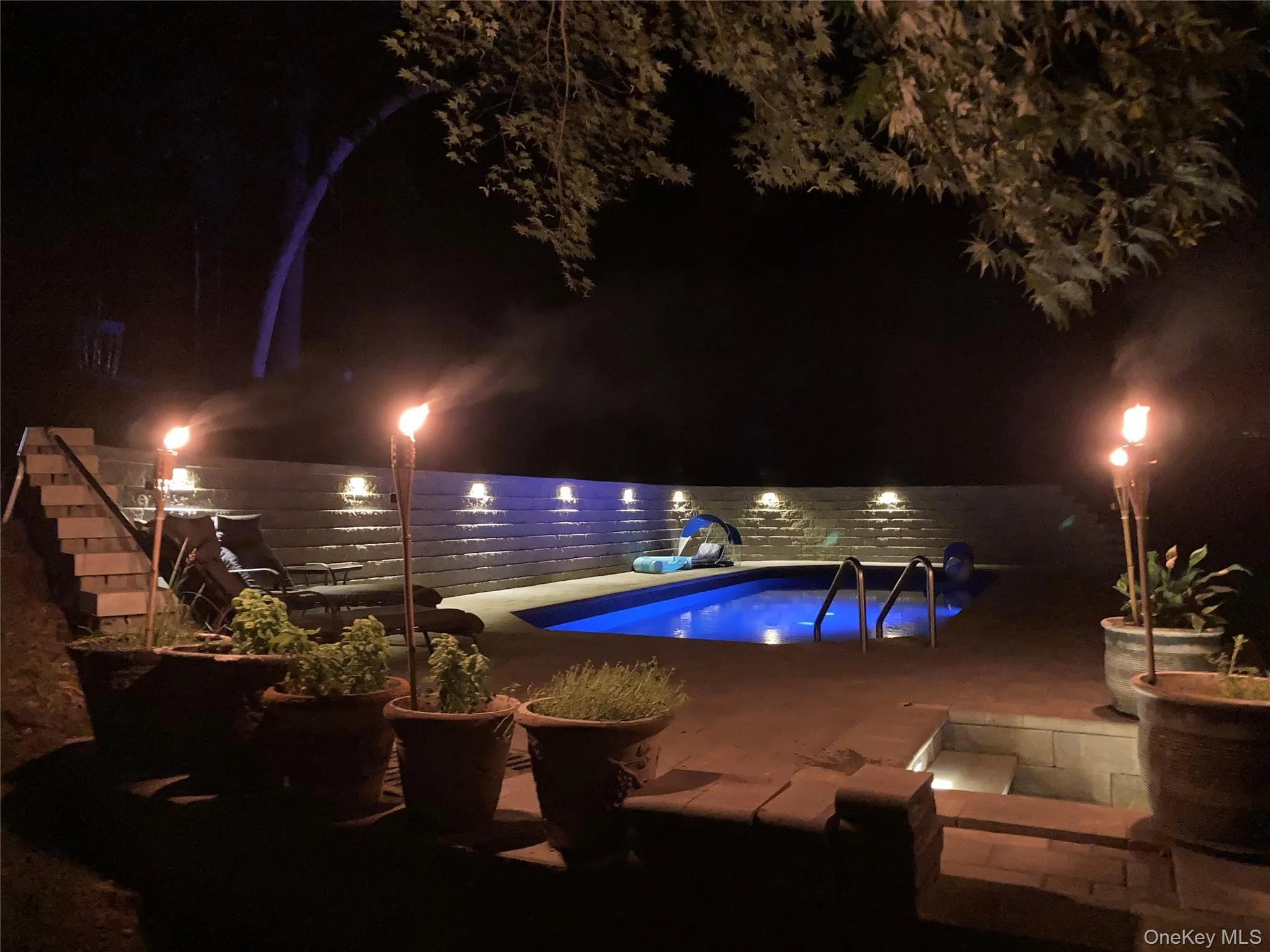 Perfect setting for a night time pool gathering. Perfect setting for a night time pool gathering.