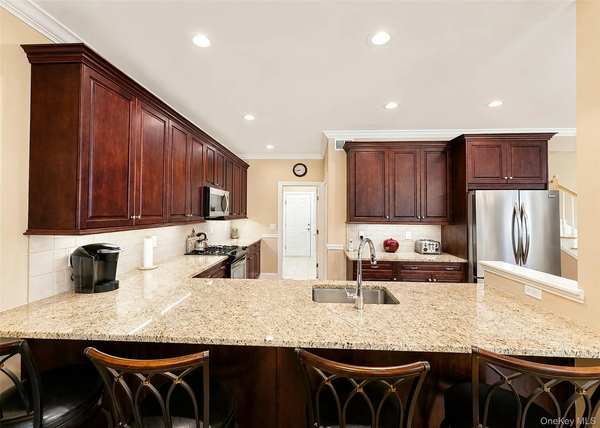 Custom Cabinetry, Stainless Appliances, & Undermount Sink. Custom Cabinetry, Stainless Appliances, & Undermount Sink.