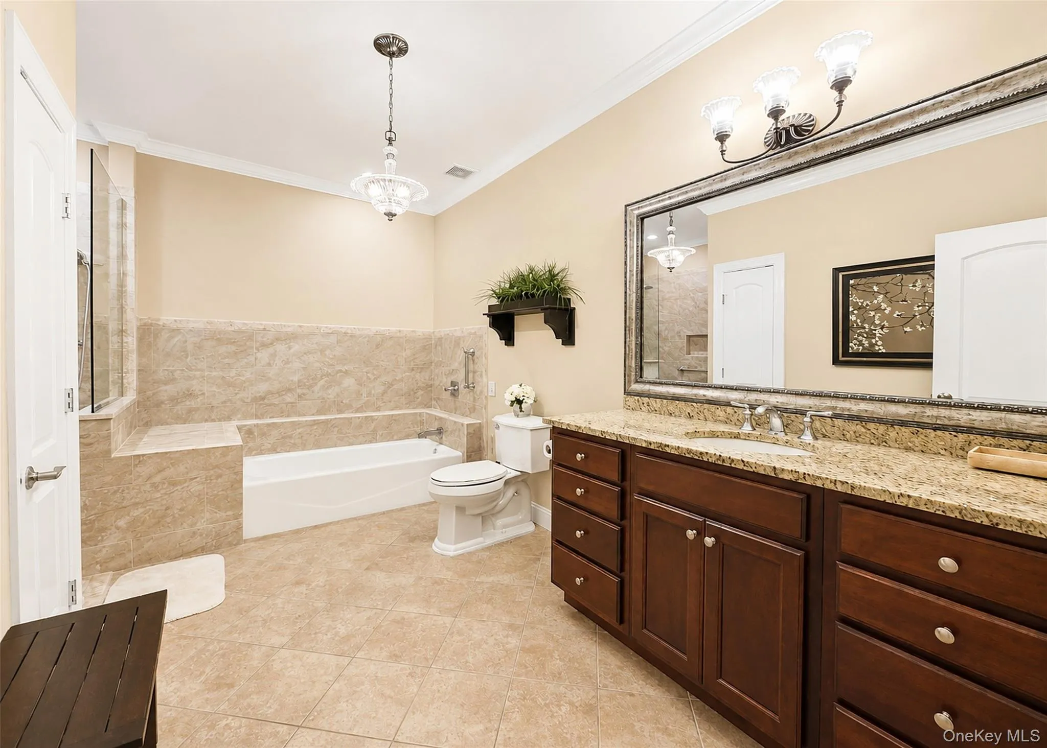 Enormous, Spa-Like Primary Bath Includes A Soaking Tub, Granite Vanity, & Kohler Fixtures. Enormous, Spa-Like Primary Bath Includes A Soaking Tub, Granite Vanity, & Kohler Fixtures.