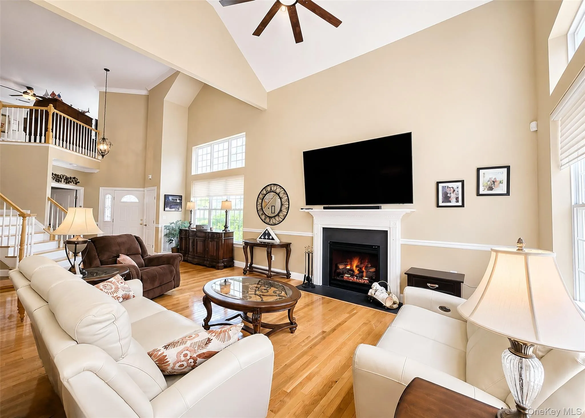 Heartwarming Gas Fireplace, Hi-Hats, & HW Flooring. Heartwarming Gas Fireplace, Hi-Hats, & HW Flooring.