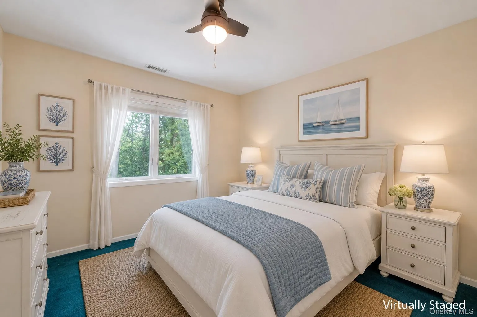 Second bedroom, carpeted, large closet and ceiling fan Second bedroom, carpeted, large closet and ceiling fan