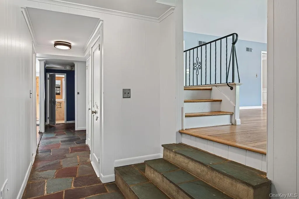 ENTRY FOYER ENTRANCE TO LIVING ROOM ENTRY FOYER ENTRANCE TO LIVING ROOM