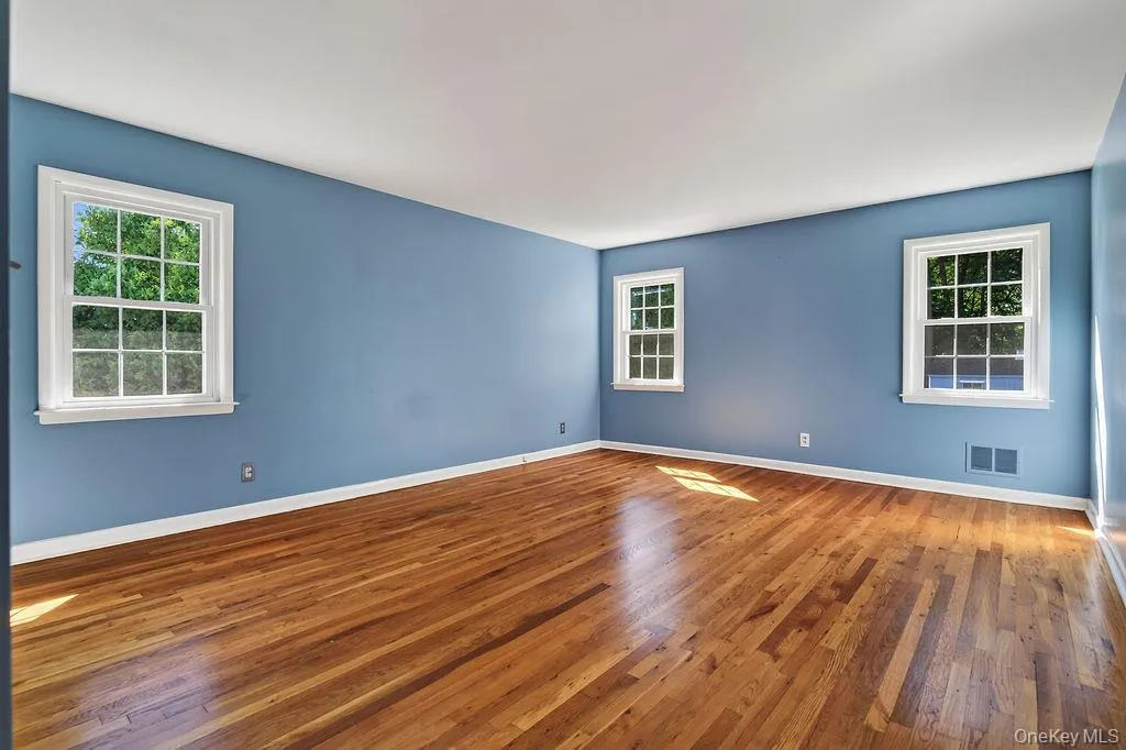 PRIMARY BEDROOM HARDWOOD FLOORS NATURAL LIGHT PRIMARY BEDROOM HARDWOOD FLOORS NATURAL LIGHT