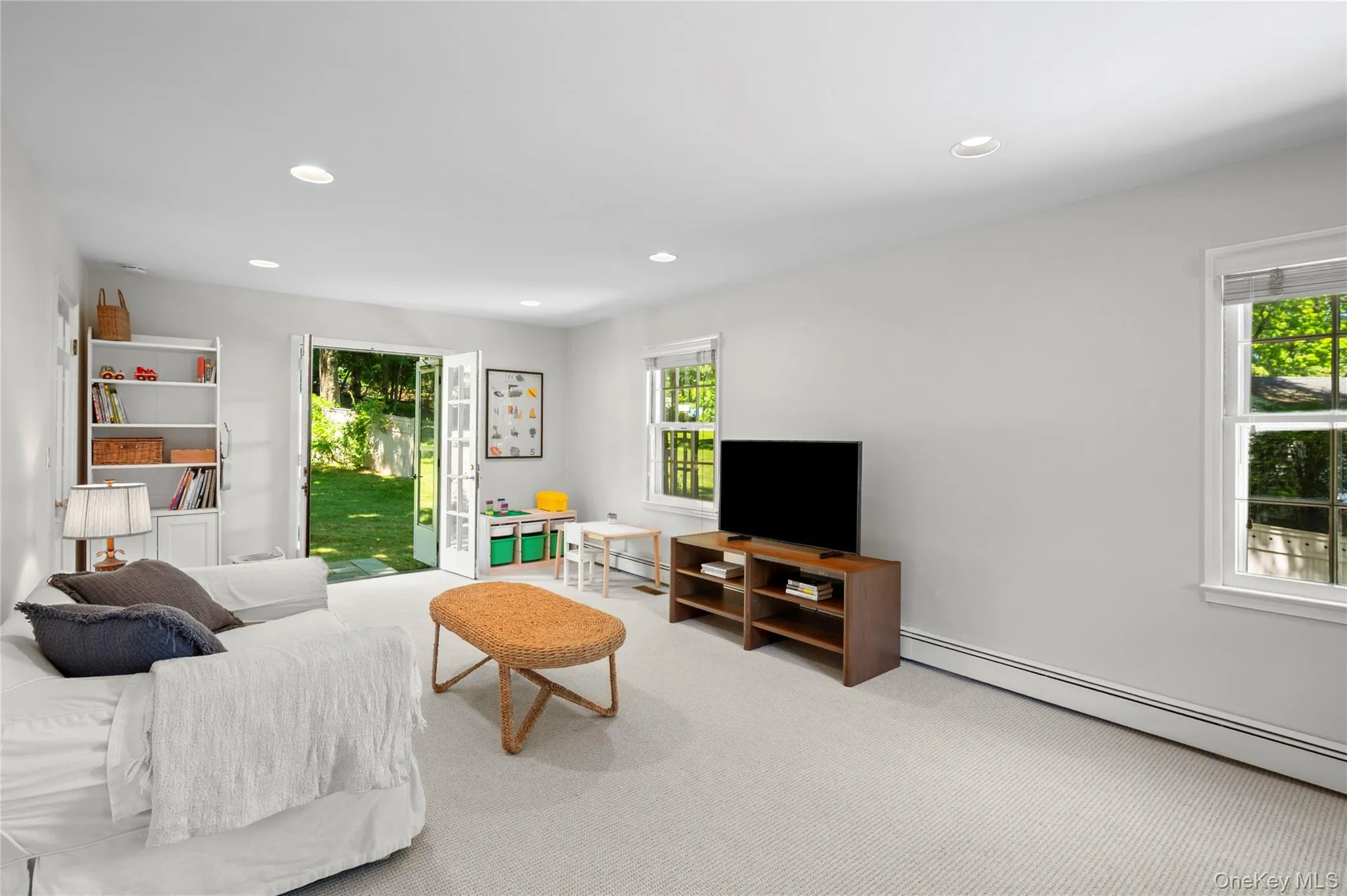 Family room has double doors for yet another opportunity to go outside. Family room has double doors for yet another opportunity to go outside.
