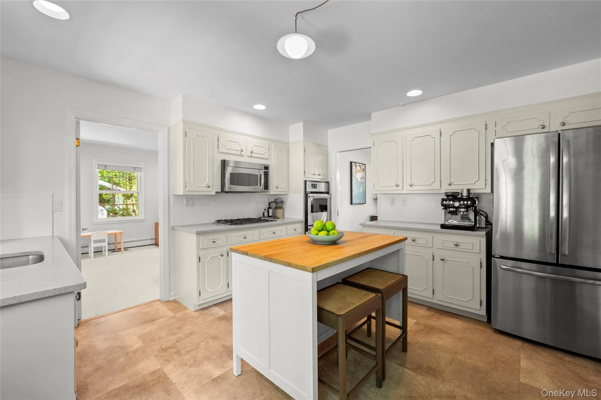 Well-designed kitchen with direct connection to the family room and main dining area for effortless entertaining. Well-designed kitchen with direct connection to the family room and main dining area for effortless entertaining.