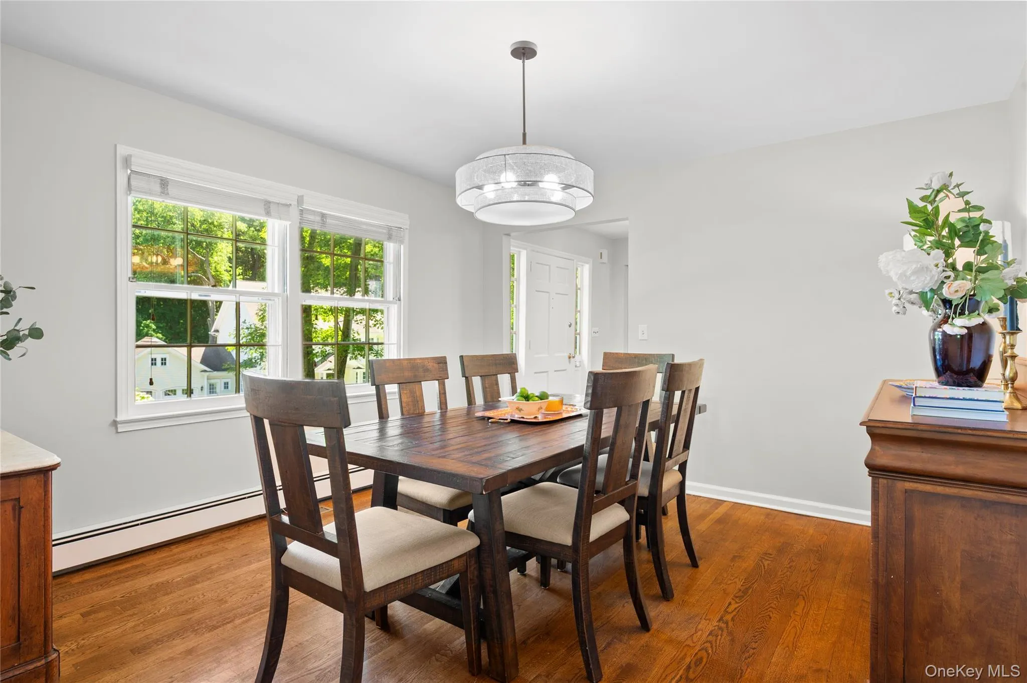 Inviting dining room with natural light and a warm, open feel Inviting dining room with natural light and a warm, open feel
