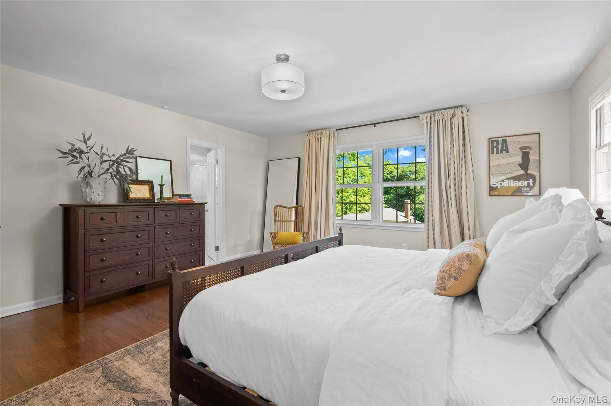 Primary bedroom offering 2 generous closets for added convenience. Primary bedroom offering 2 generous closets for added convenience.