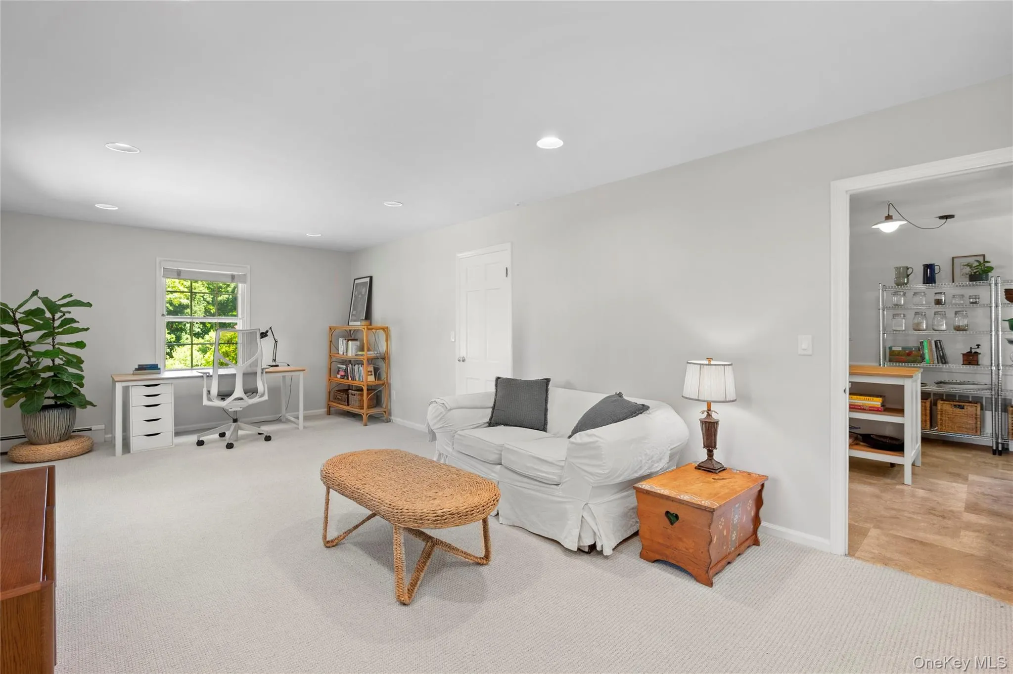 Family room connected to the kitchen, ideal for gatherings and casual living. Family room connected to the kitchen, ideal for gatherings and casual living.