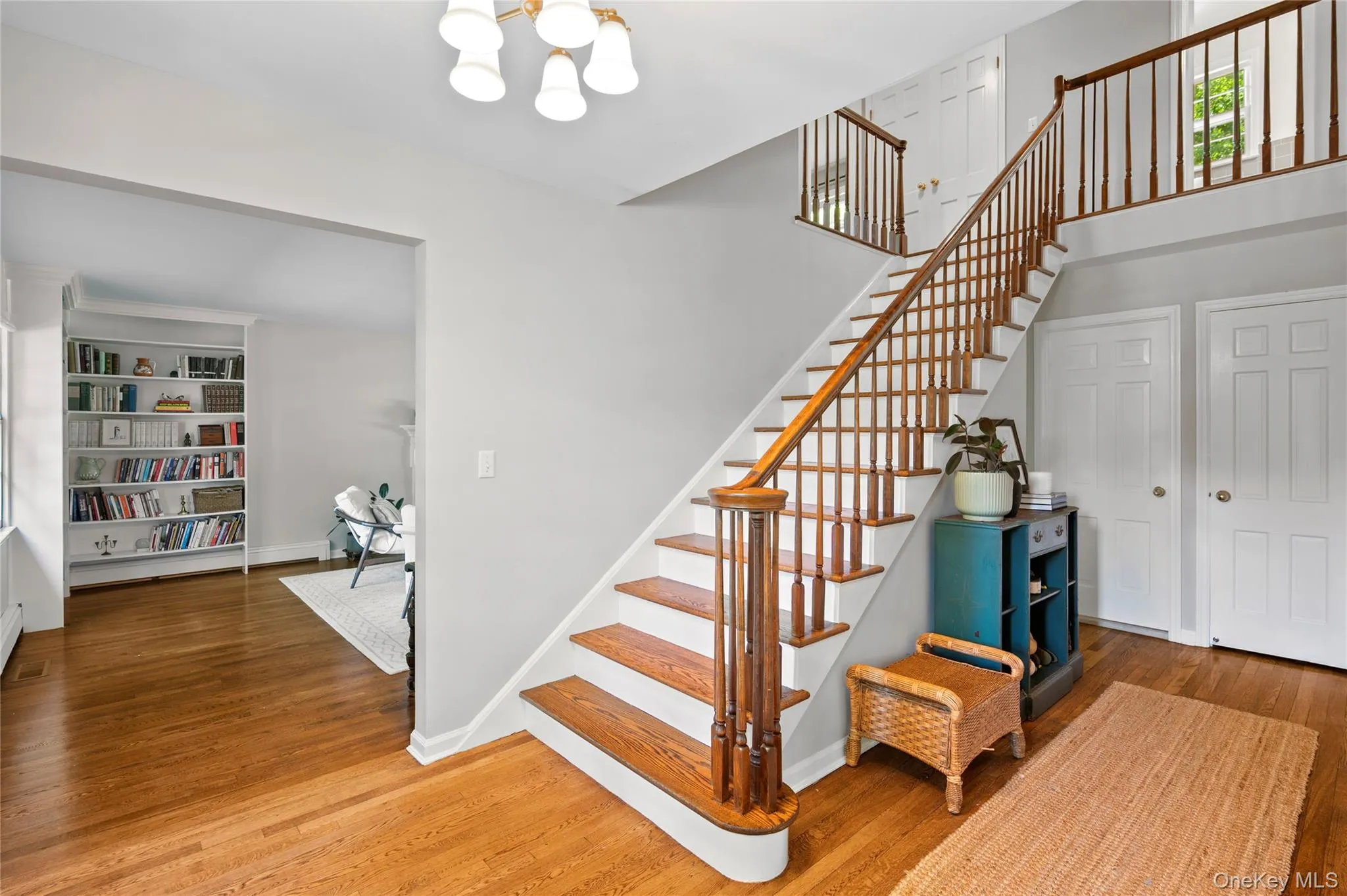 Broad, central staircase leading to the upper-floor living area. Broad, central staircase leading to the upper-floor living area.