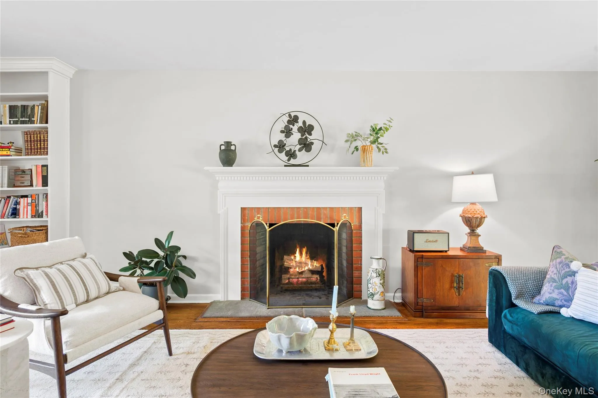Enjoy the charm and comfort of the home's fireplace, an inviting focal point for gathering and entertaining. Enjoy the charm and comfort of the home's fireplace, an inviting focal point for gathering and entertaining.