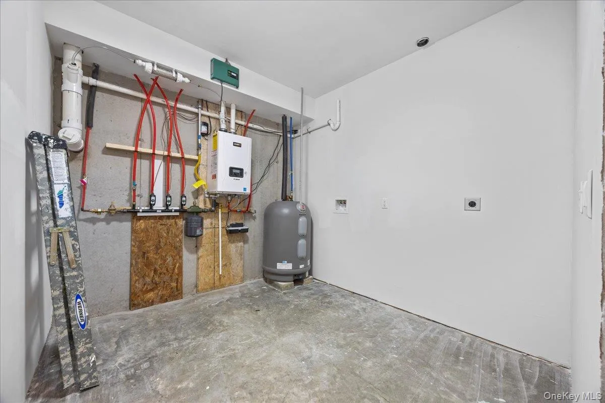 Utility room with washer/dryer connections. Utility room with washer/dryer connections.