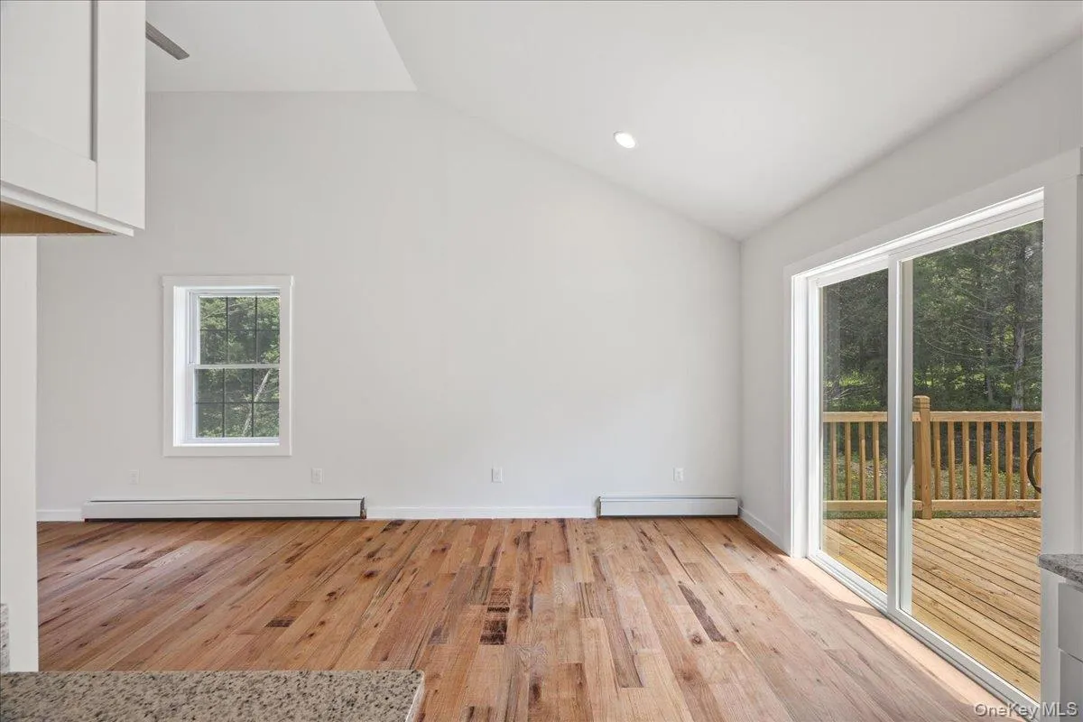 Sliding glass doors lead to the rear porch. Sliding glass doors lead to the rear porch.