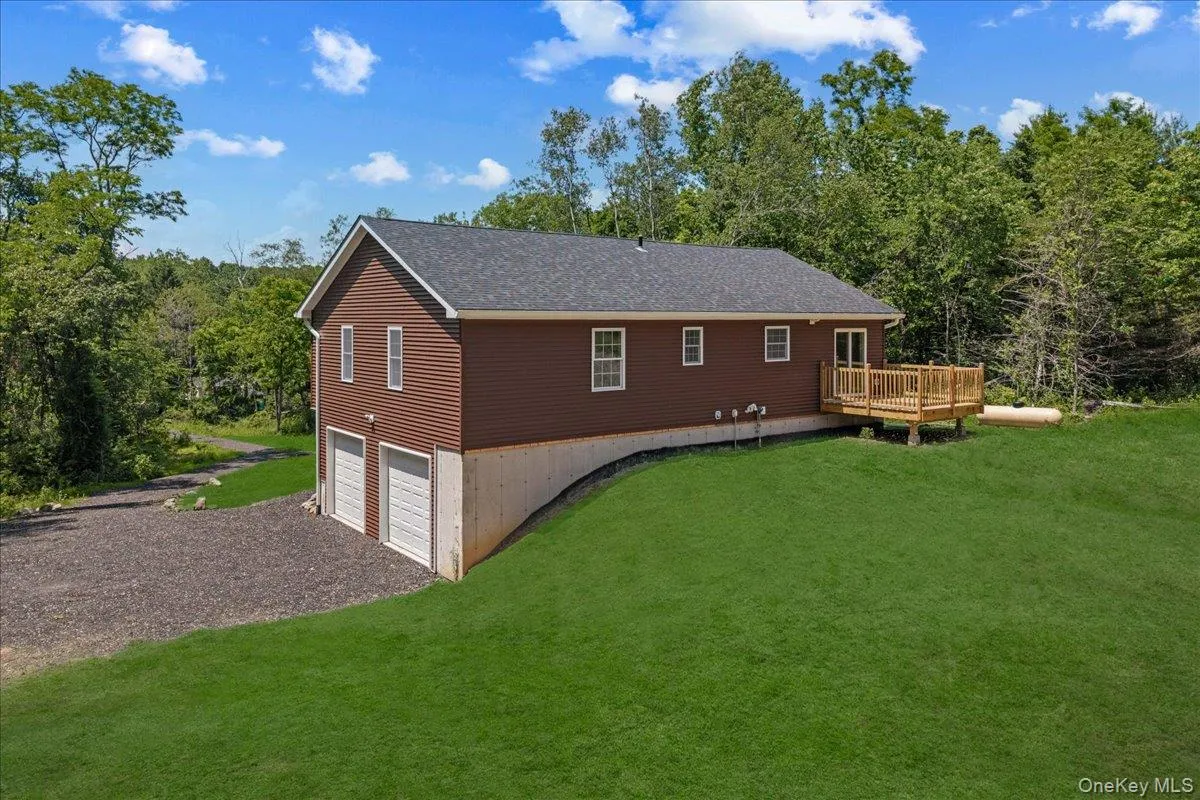 Yard space and ample driveway parking. (Yard photos are enhanced to show the potential after seeding). Yard space and ample driveway parking. (Yard photos are enhanced to show the potential after seeding).