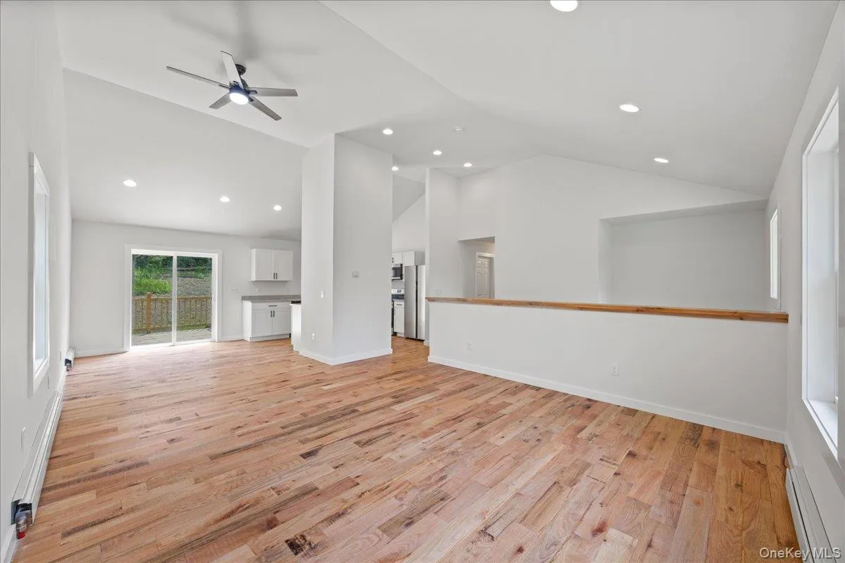 Open floor plan flows seamlessly into the dining room and kitchen. Open floor plan flows seamlessly into the dining room and kitchen.