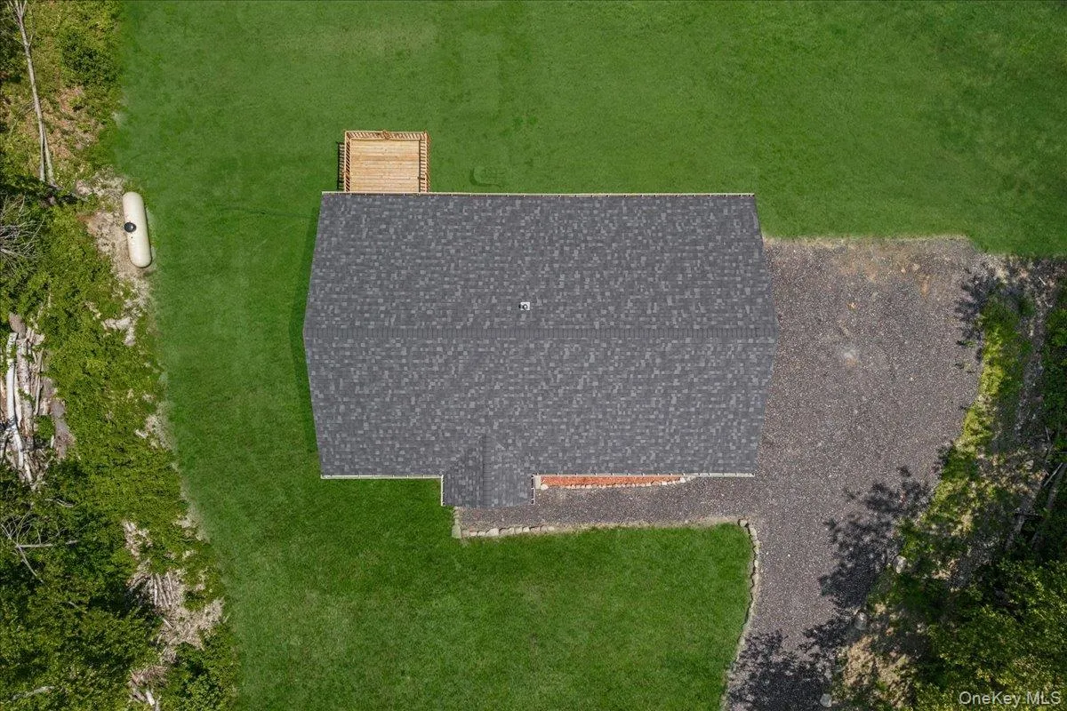 Overhead of the home. (Yard photos are enhanced to show the potential after seeding). Overhead of the home. (Yard photos are enhanced to show the potential after seeding).