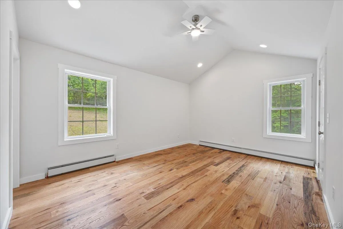 Primary bedroom features vaulted ceilings, en-suite bath and walk-in closet. Primary bedroom features vaulted ceilings, en-suite bath and walk-in closet.