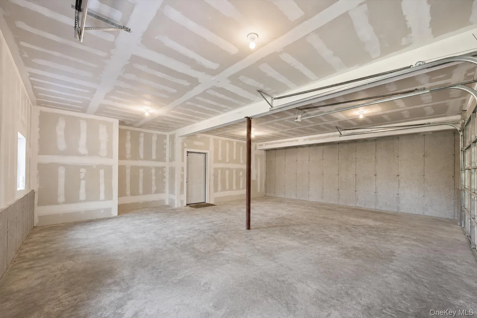 Oversized two car garage. Oversized two car garage.