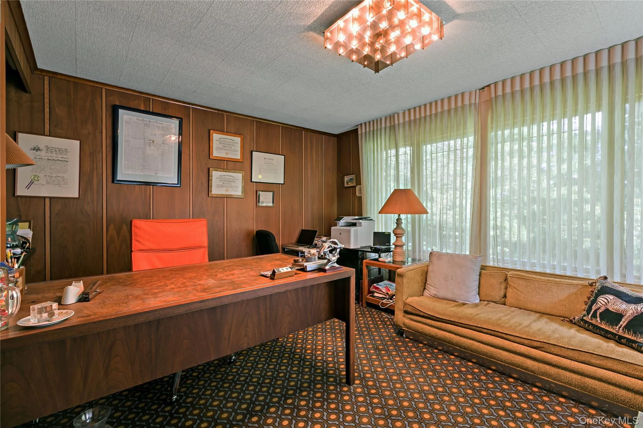 Home office with views of the golf course and rear yard Home office with views of the golf course and rear yard
