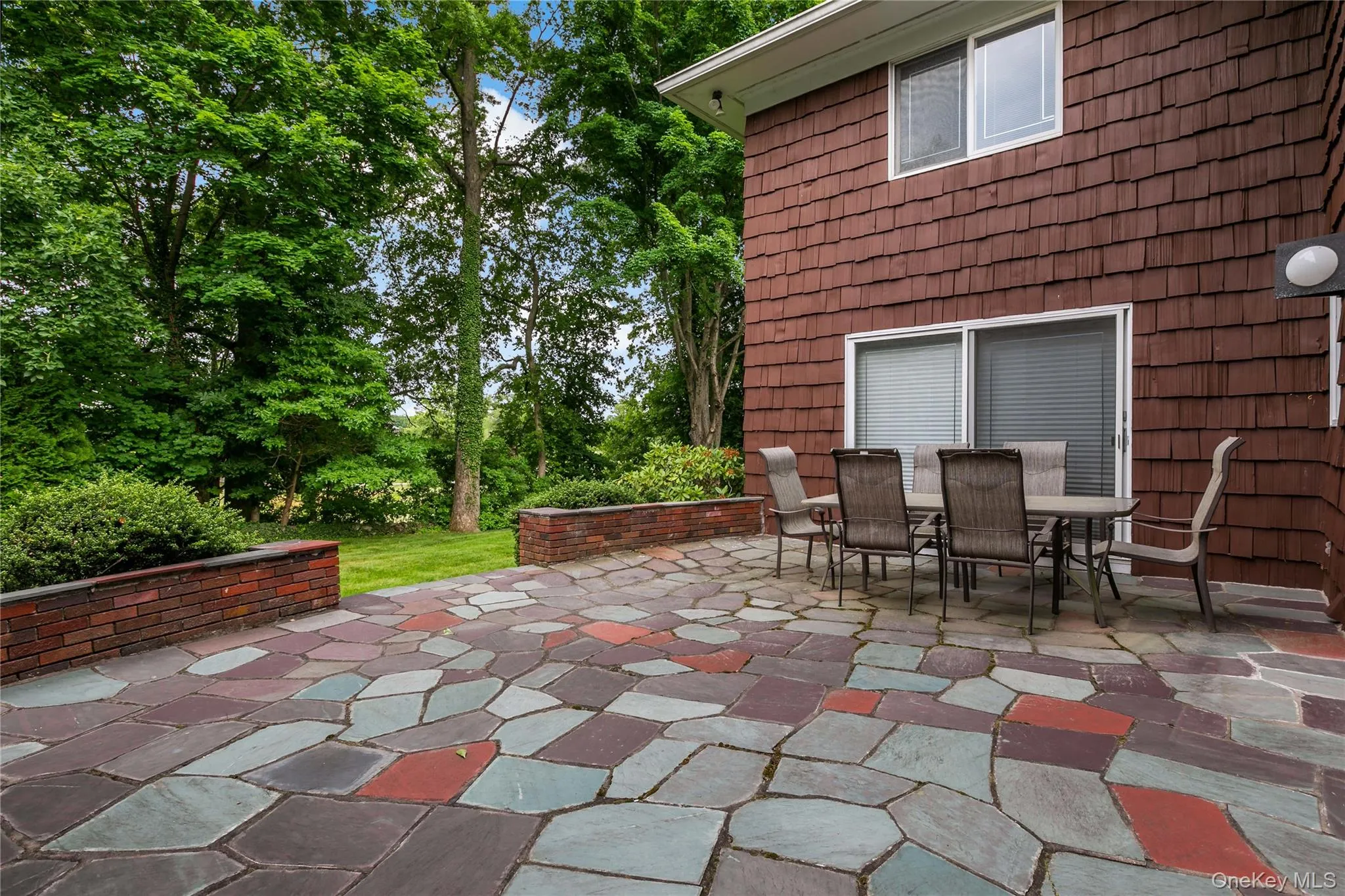 Slate Patio that sits off the kitchen for easy entertaining Slate Patio that sits off the kitchen for easy entertaining