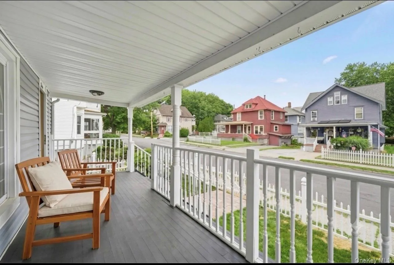 Enclosed front porch with view of Beattie Ave. Enclosed front porch with view of Beattie Ave.