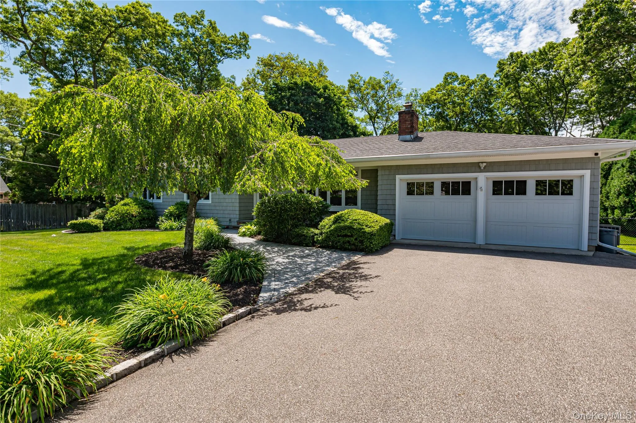 Large Driveway for 6 Cars with 2 Car Immaculate Garage and Attic Storage with pull down stairs Large Driveway for 6 Cars with 2 Car Immaculate Garage and Attic Storage with pull down stairs