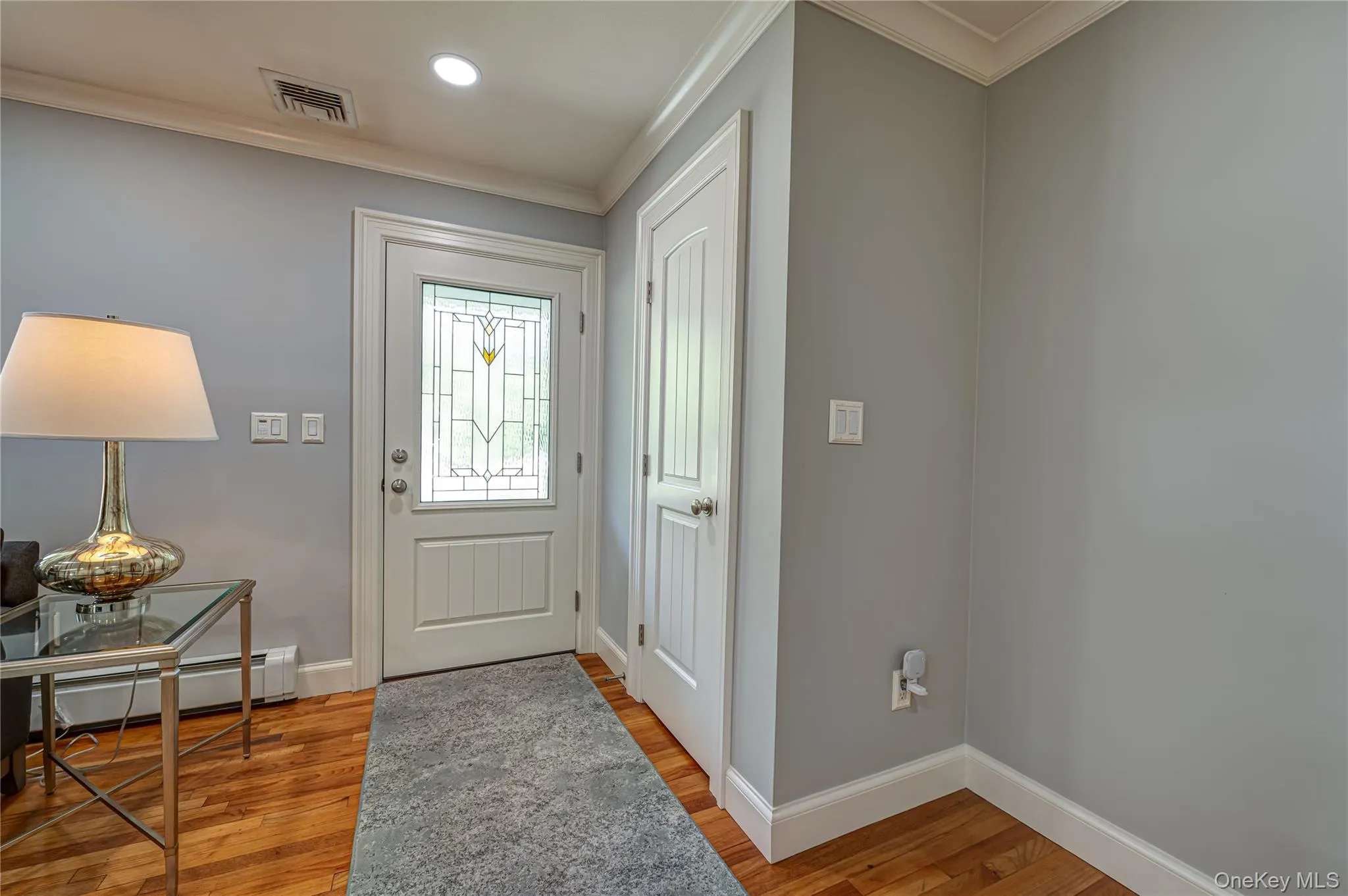 Entry Foyer with Closet, and Decorative Insulated Front Door with Leaded Glass Entry Foyer with Closet, and Decorative Insulated Front Door with Leaded Glass