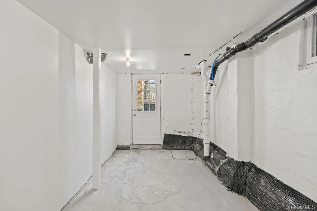 Below grade area with concrete block wall Below grade area with concrete block wall