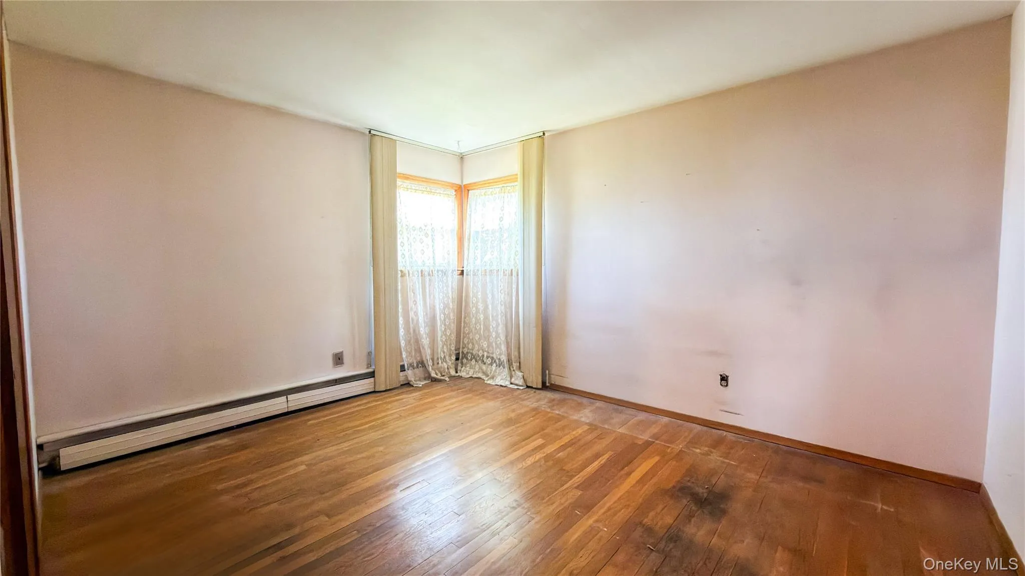 Bedroom with wood floors Bedroom with wood floors