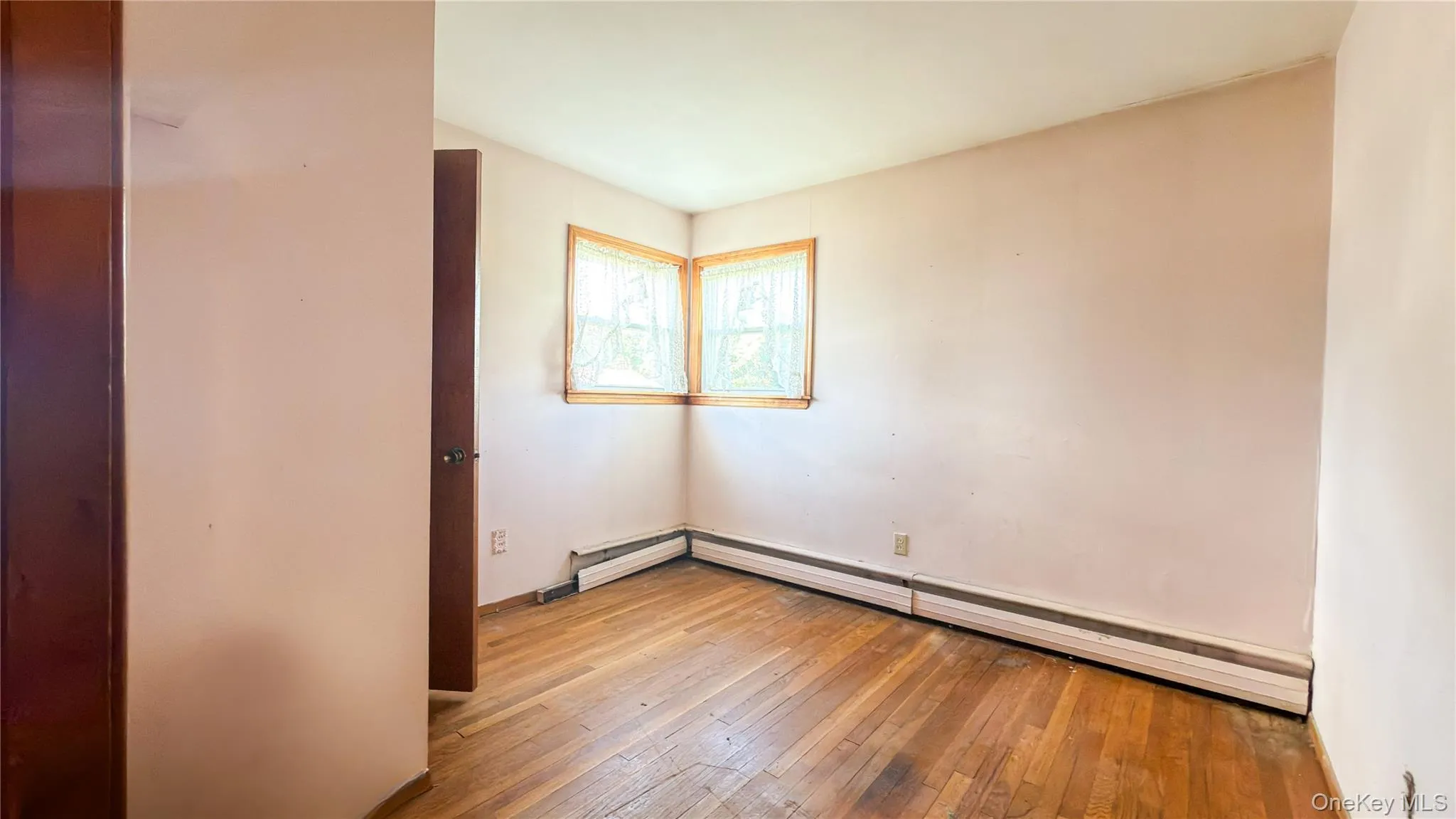 Bedroom with wood floors Bedroom with wood floors