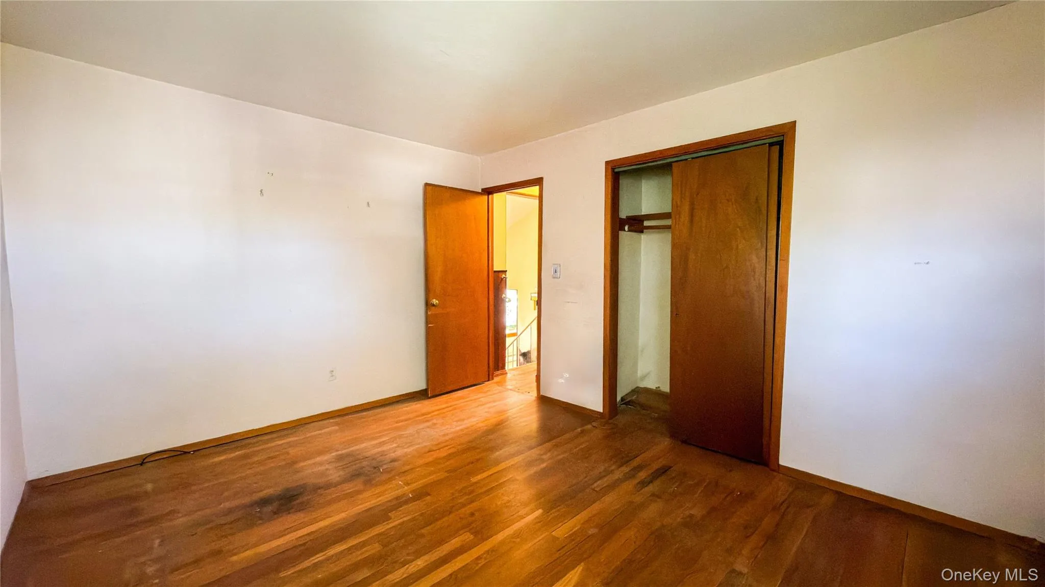 Bedroom with wood floors Bedroom with wood floors