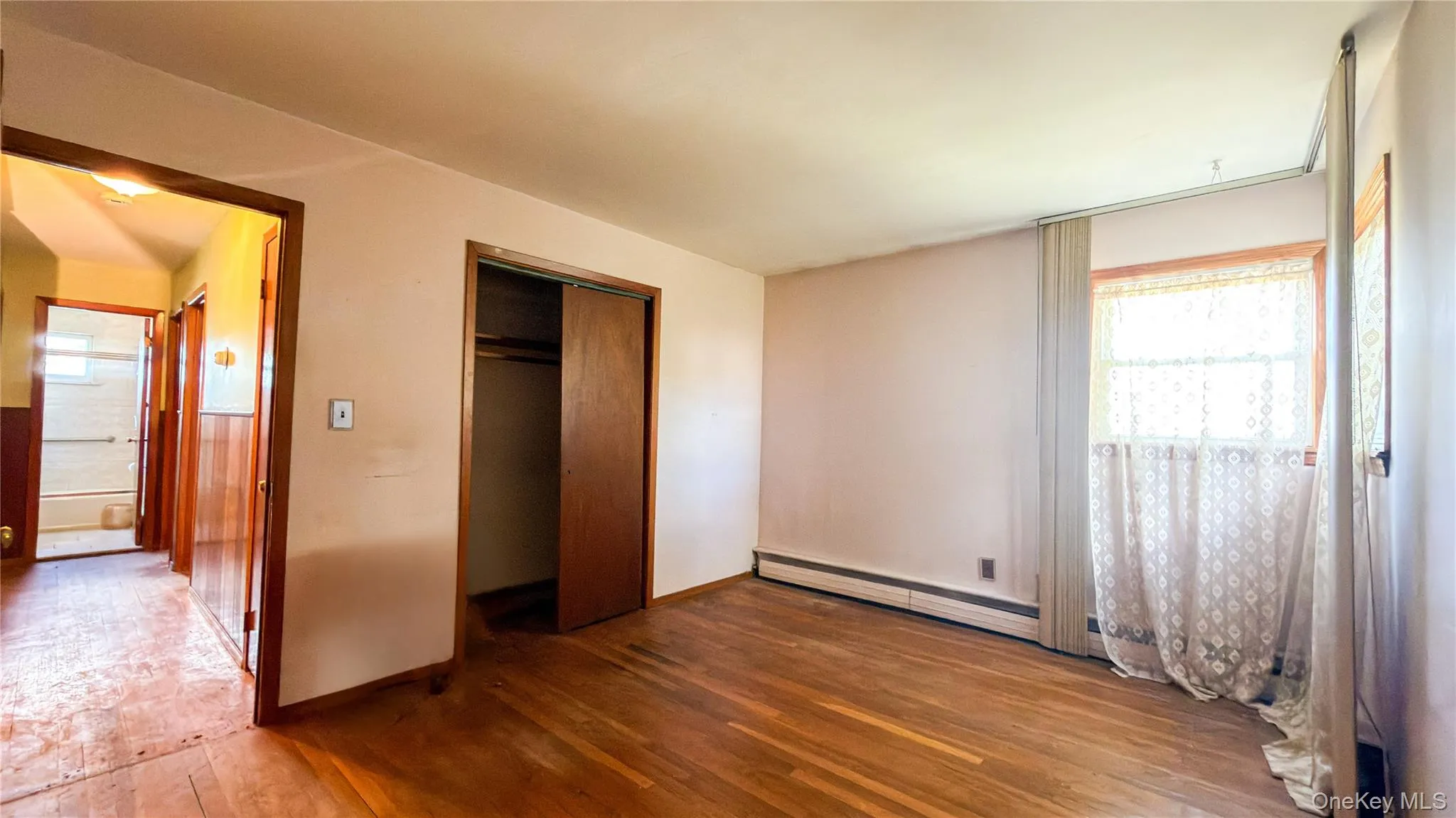 Bedroom with wood floors Bedroom with wood floors