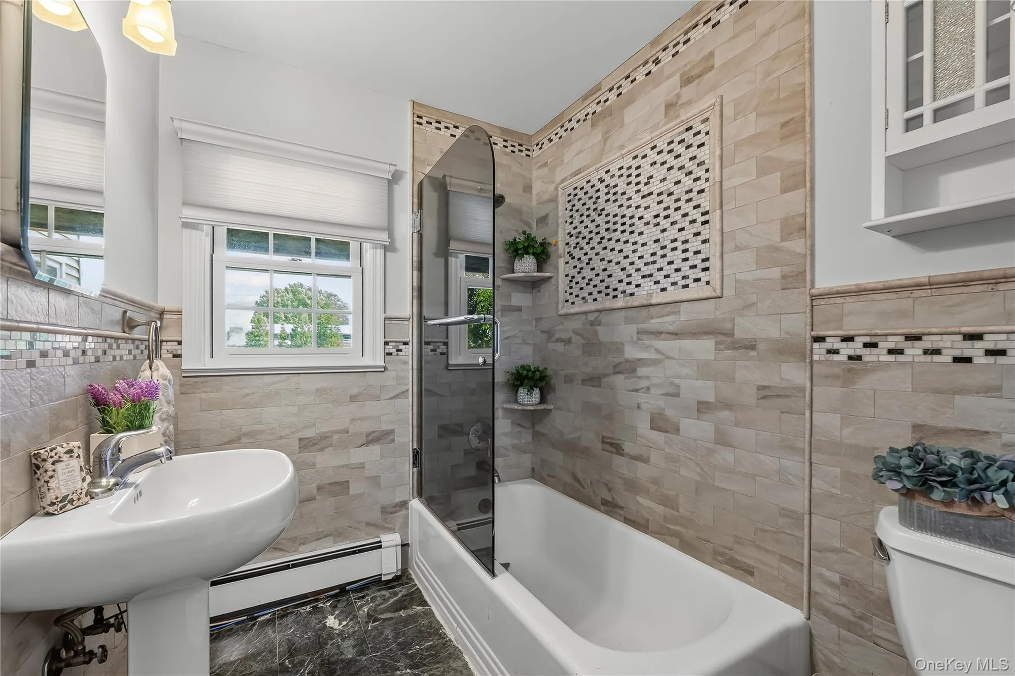 Spacious and modern main floor bath. Spacious and modern main floor bath.