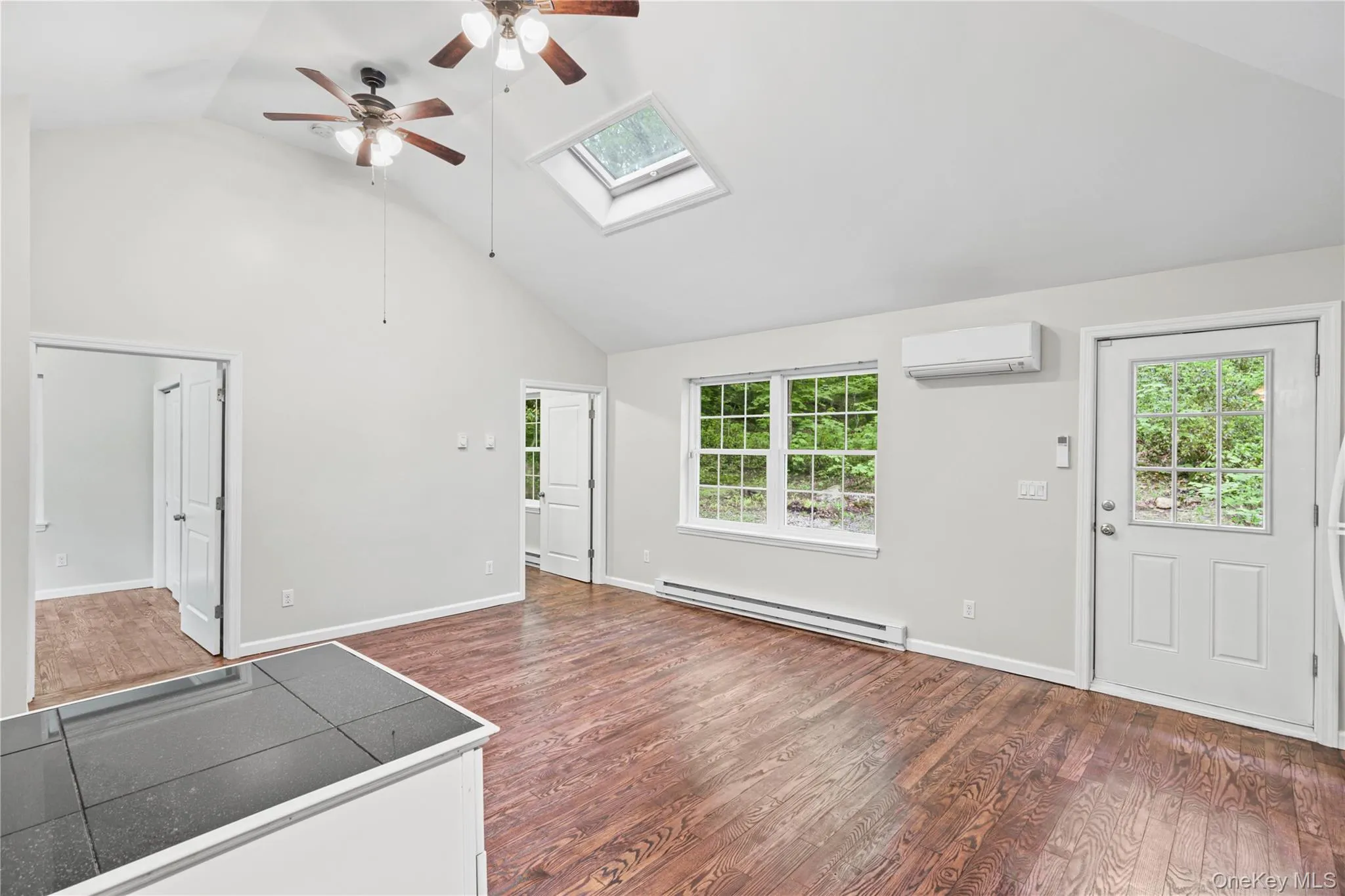 The property enjoys easy access to the backyard with a patio and a lovely canopy of trees making for a tranquil and serene backdrop. The property enjoys easy access to the backyard with a patio and a lovely canopy of trees making for a tranquil and serene backdrop.
