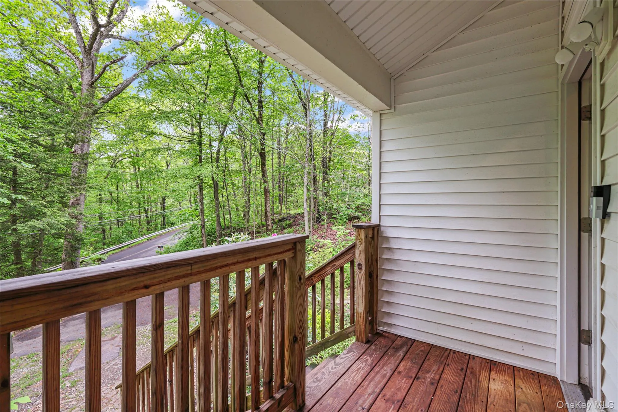 View of the front deck and entry to home. View of the front deck and entry to home.